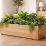 apportez une touche d'élégance naturelle à votre intérieur ou extérieur avec une jardinière en bois, alliant esthétique raffinée et durabilité pour sublimer votre espace.