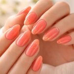 découvrez les dernières tendances manucure et sublimez vos ongles avec le vibrant orange corail, une couleur lumineuse et pleine d'énergie pour un look estival et élégant.