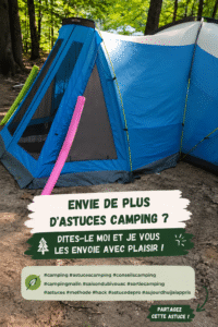 Une tente de camping installée dans la nature avec des équipements de camping bien organisés.