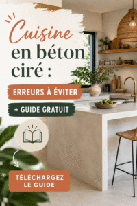 Cuisine moderne en béton ciré avec îlot central élégant et plans de travail lisses.